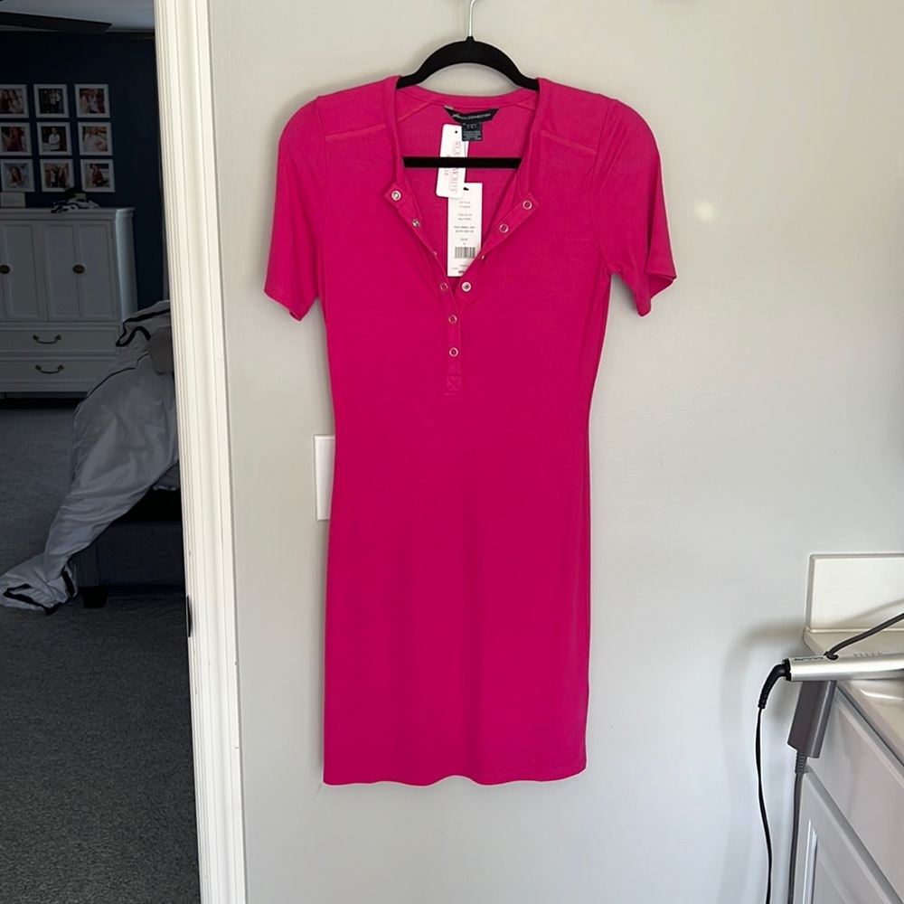 Pink short sleeve dress, never worn, didn’t like the color on me but fits